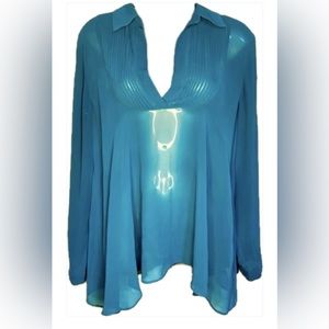 Free People sheer blouse. Size Small.Turquoise.